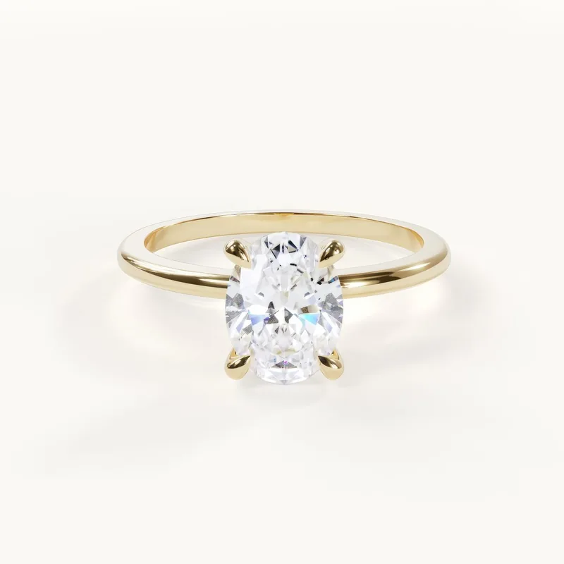 Elegance, oval solitaire ring in yellow gold