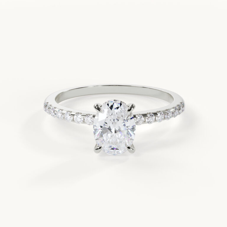 1-carat oval diamond with a pavé ring in white gold