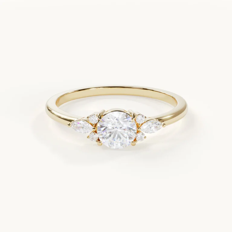 Muse Lumière Brilliant Engagement Ring with a 0.5-ct. round centre stone and marquise-cut side stones in yellow gold – Front view