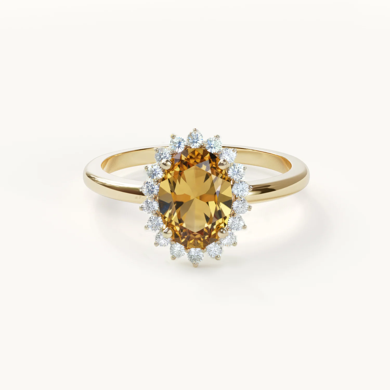 Gold ring with an oval amber stone and diamonds