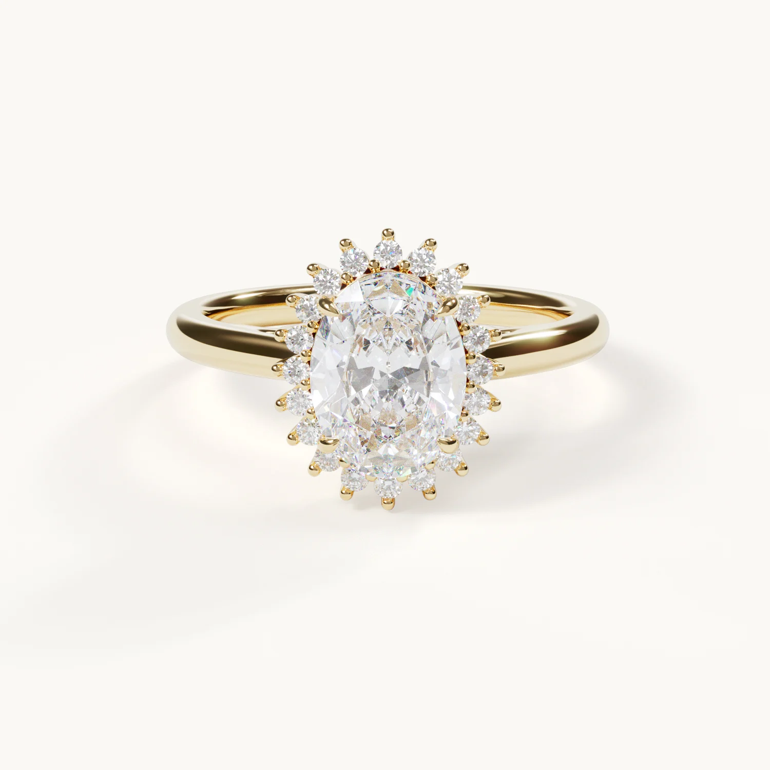Oval engagement ring with a 1.5 ct stone in 14k yellow gold with a halo setting – Velur