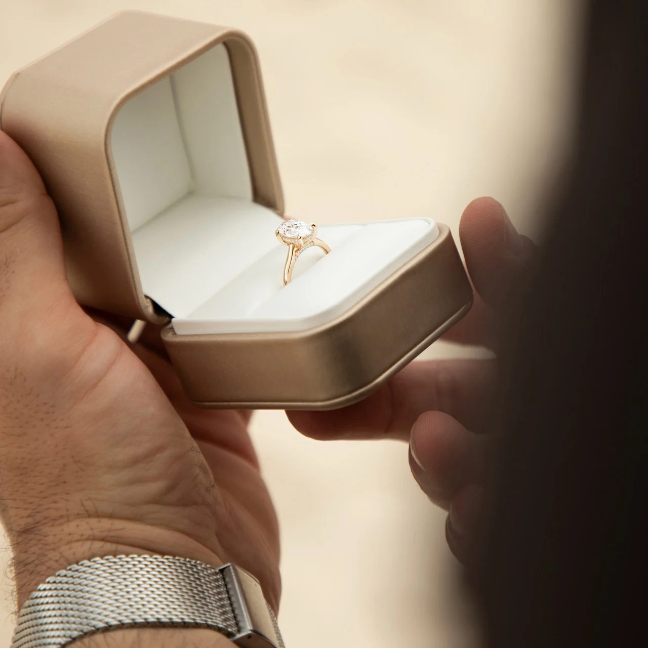 Velur ring box with the engagement ring inside, open