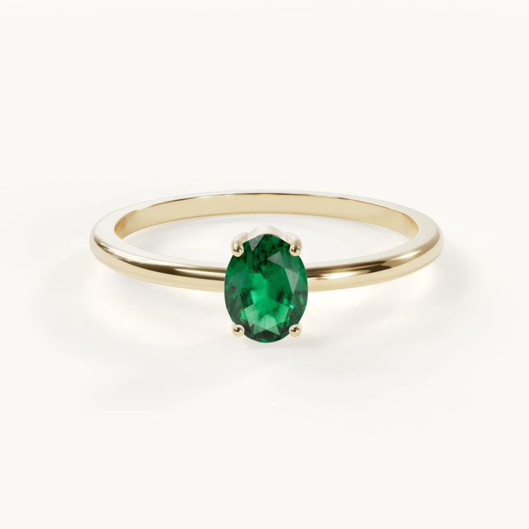Velur Muse Aurora geboortesteen halo-ring met smaragd in goud