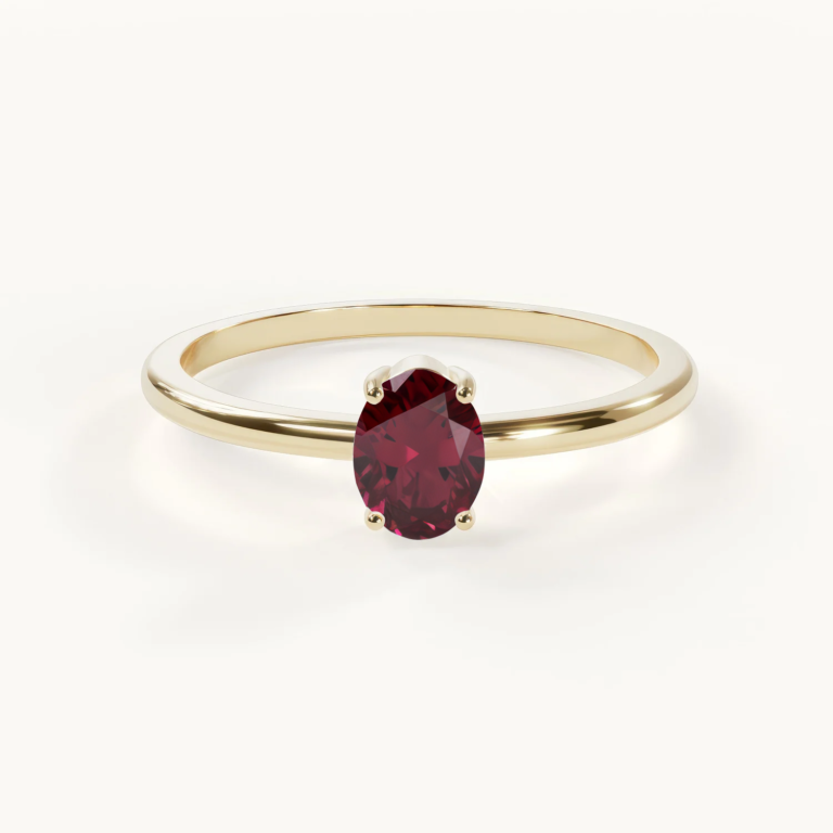 Velur Muse Aurora geboortesteen halo-ring met robijn in goud