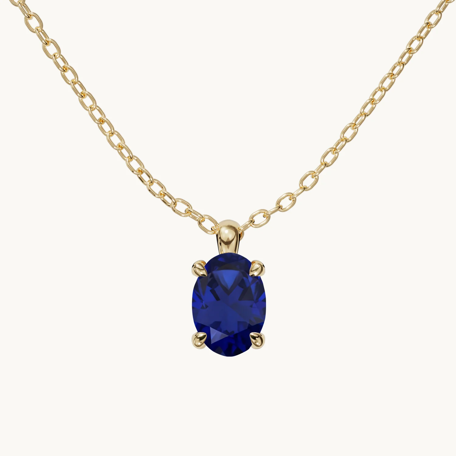 Amélie Geburtsstein Halskette Vertikal mit blauem Saphir in Gold Vermeil