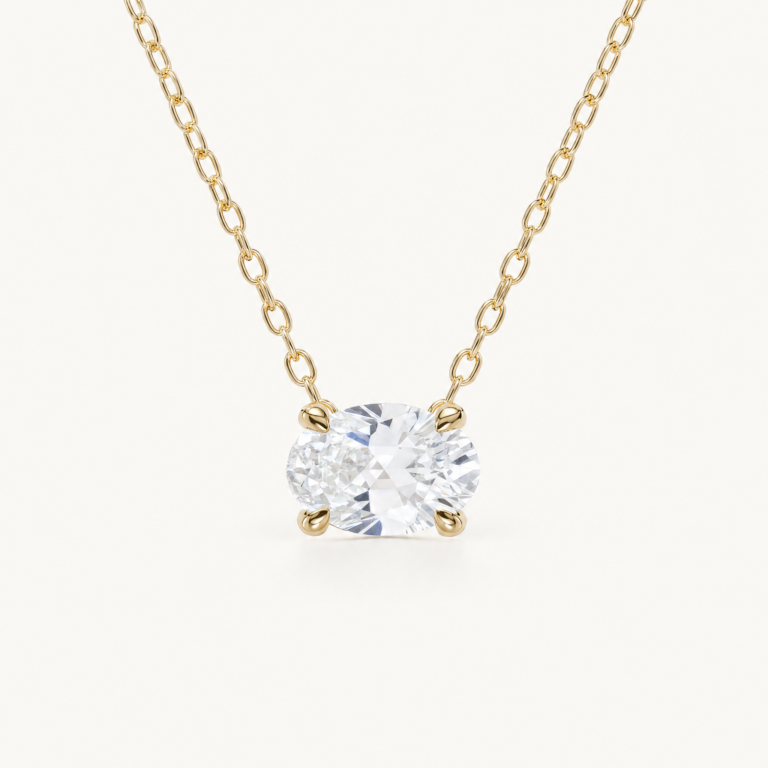 Amélie-Geburtssteinkette mit horizontal gefasstem ovalem weißen Saphir in Gelbgold