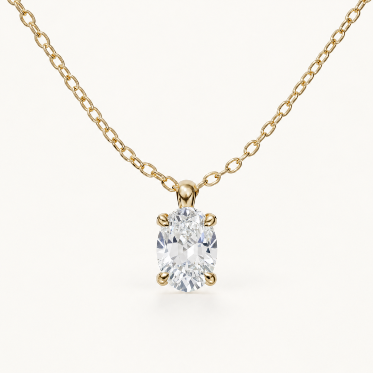 Amélie-Geburtssteinkette mit vertikal gefasstem ovalem weißen Saphir in Gelbgold