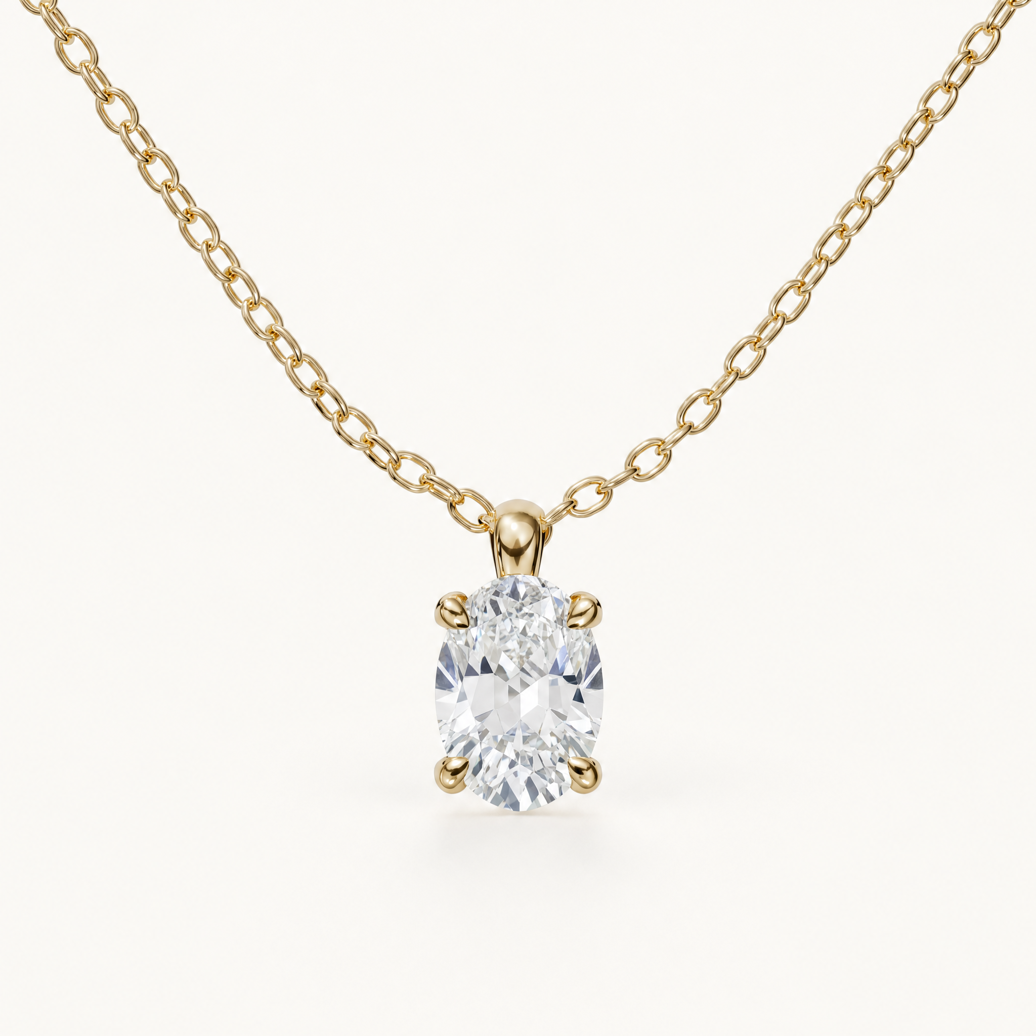 Amélie-Geburtssteinkette mit vertikal gefasstem ovalem weißen Saphir in Gelbgold