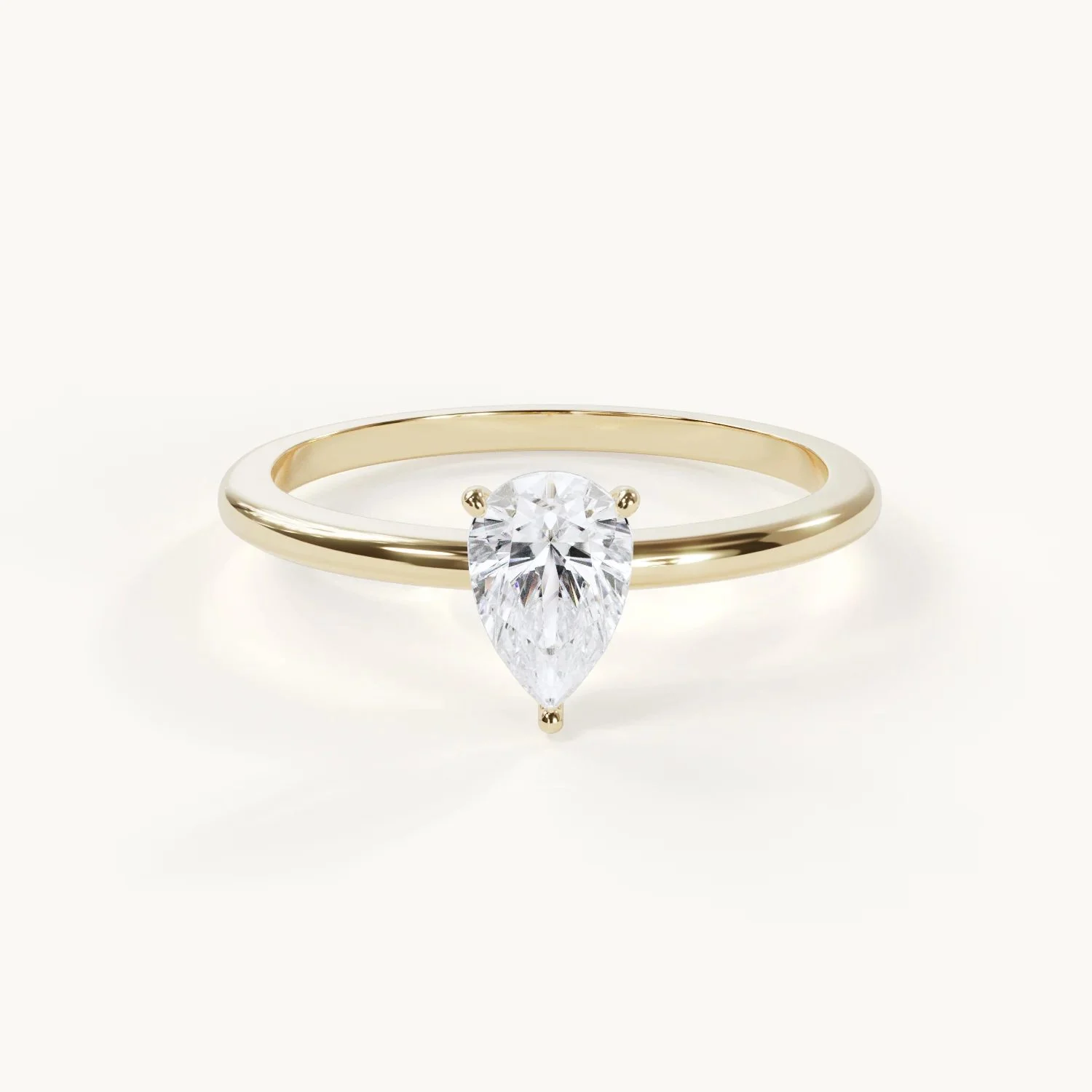 Teardrop-shaped engagement ring in yellow gold with a 0.5-carat moissanite – Pear Solitaire by Velur