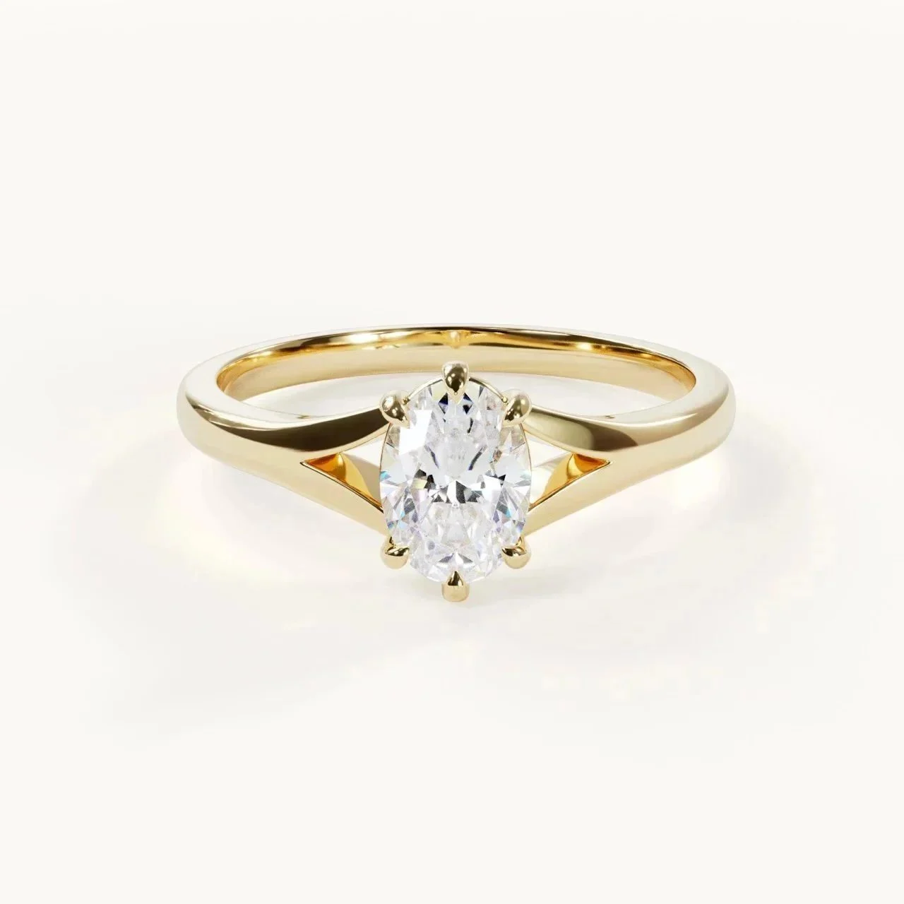 Clarté Tapered Oval Solitaire Engagement Ring – Tapered Oval Solitaire by Velur in Yellow Gold