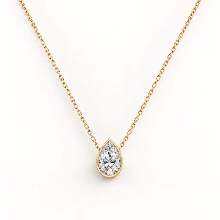 Drop-shaped diamond necklace in 14K yellow gold with a 0.7-mm chain, front view