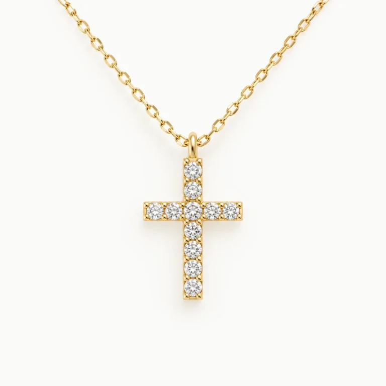 Cross pendant with eleven lab-grown diamonds in 14K yellow gold on a 0.7-mm anchor chain