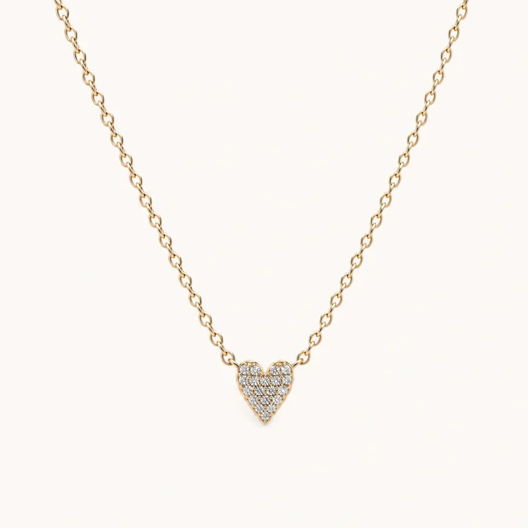 Mini Heart – Pavé Lab-Grown Diamond Necklace in 14K Yellow Gold on a Light Background